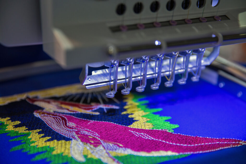 Professional machine for applying embroidery closeup